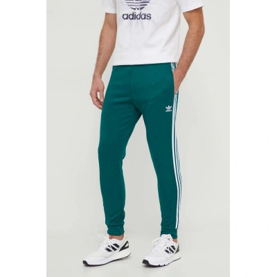 Tepláky adidas Originals zelená barva, s aplikací, IR9886