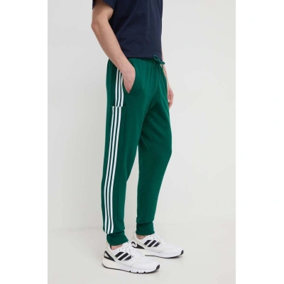 Bavlněné tepláky adidas zelená barva, s aplikací, IS1392